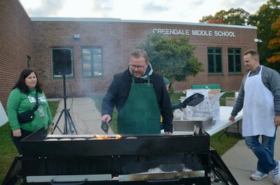 Principal Ray Curry Works the Grill