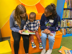 Seventh Graders Volunteer to Read With Young Learners in Community