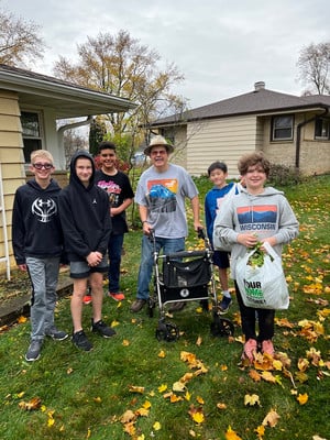 In Fall Clean and Green Event 7th Graders Help Senior Citizens With Chores