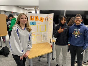 Eighth Graders Share Their Research on Mental Health Issues at Family Wellness Event