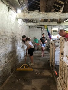 Seventh Grade Service Learning Brings Spring Cleaning to Trimborn Farm