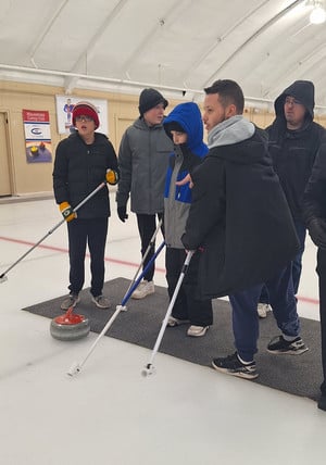 Students Try Adaptive Curling!