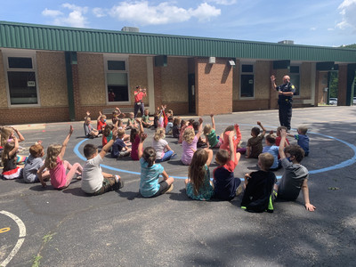 Officer Vlaj with students at CA