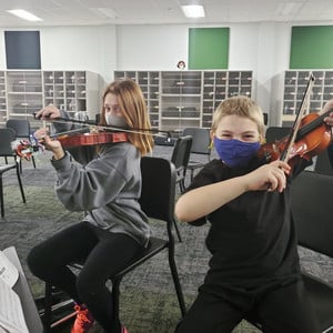 Orchestra Mentoring Connects Students/Spreads Joy