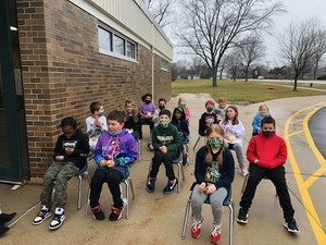 Warm December Weather Prompts a 3rd Grade Outdoor Read-Aloud