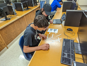 Computer Science Students Use Paper to Describe Code Through Abstraction