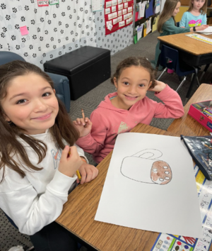 First & Fifth Grade Buddies Make Placemats to Brighten Meals for Seniors