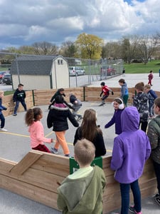 Students Enjoying New Gaga Ball Pit on Playground
