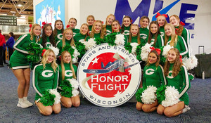 Cheer Team Welcomes Veterans Returning From Honor Flight