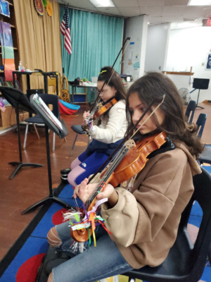 Students Working Hard to Prepare for Orchestra and Choir Concert