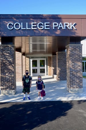 College Park Students Under New School Sign